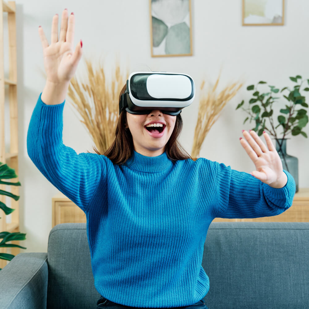 excited woman in vr headset GK8KVDB 1