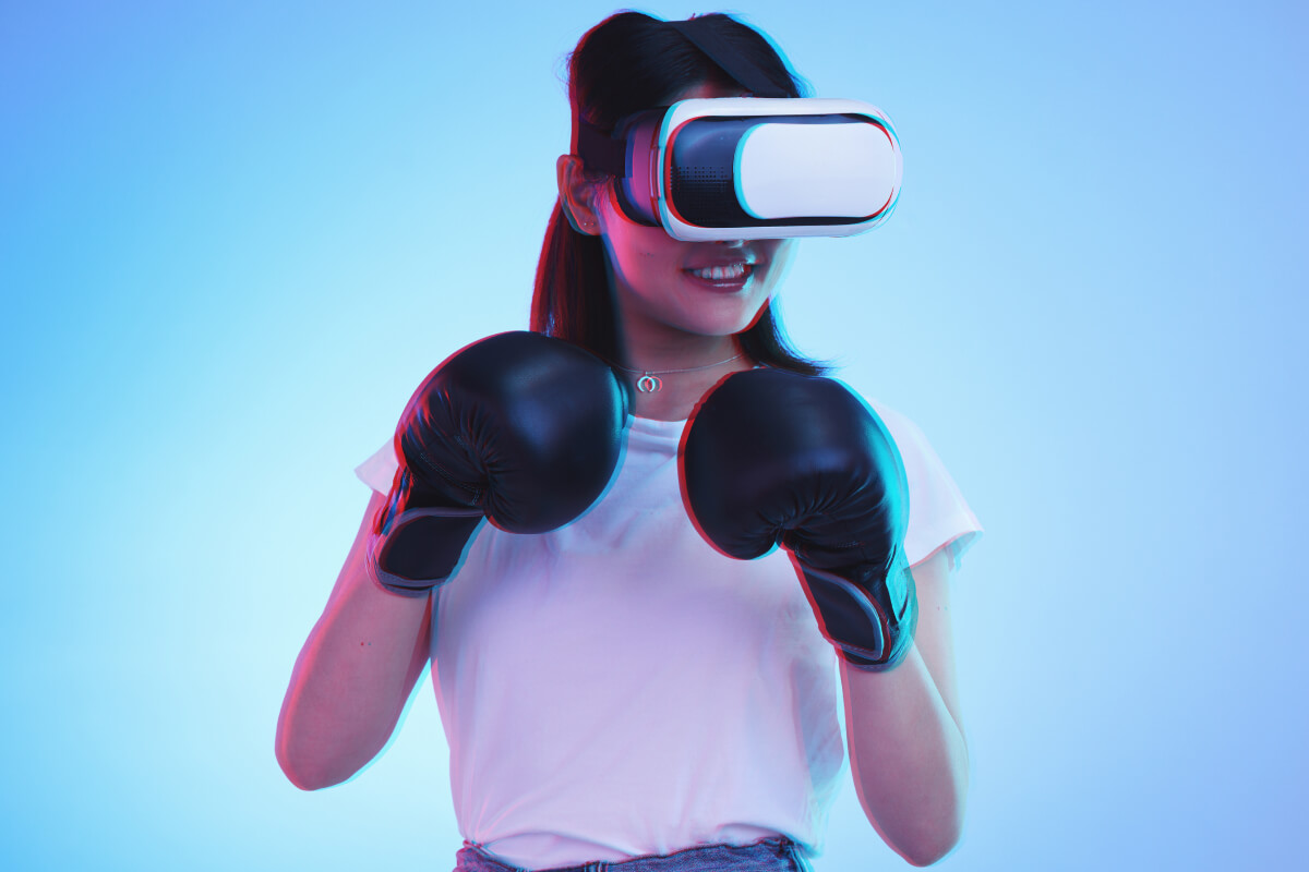 virtual reality metaverse and a gamer woman boxin P8FZ9NM